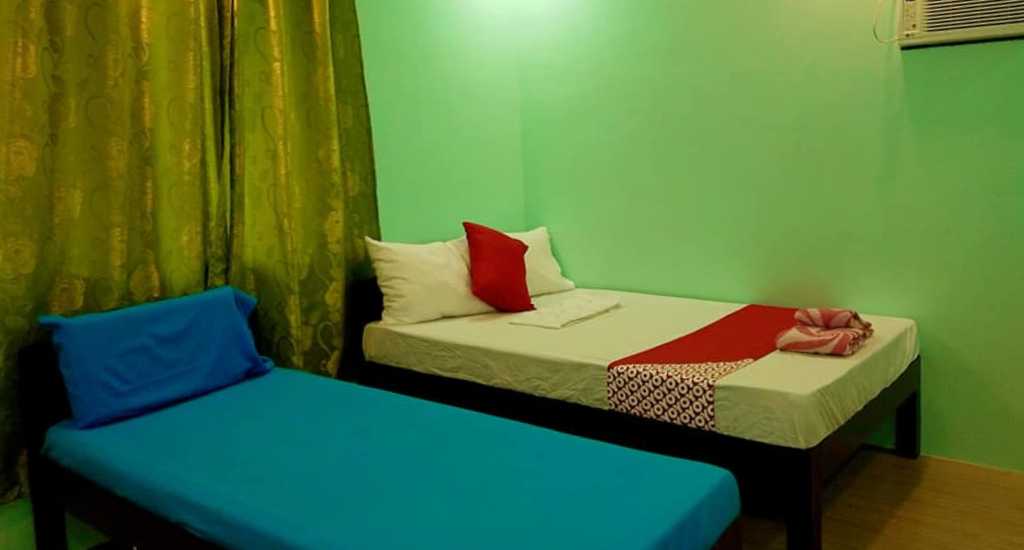 Bedroom in Oyo 777 RN Guesthouse in Moalboal